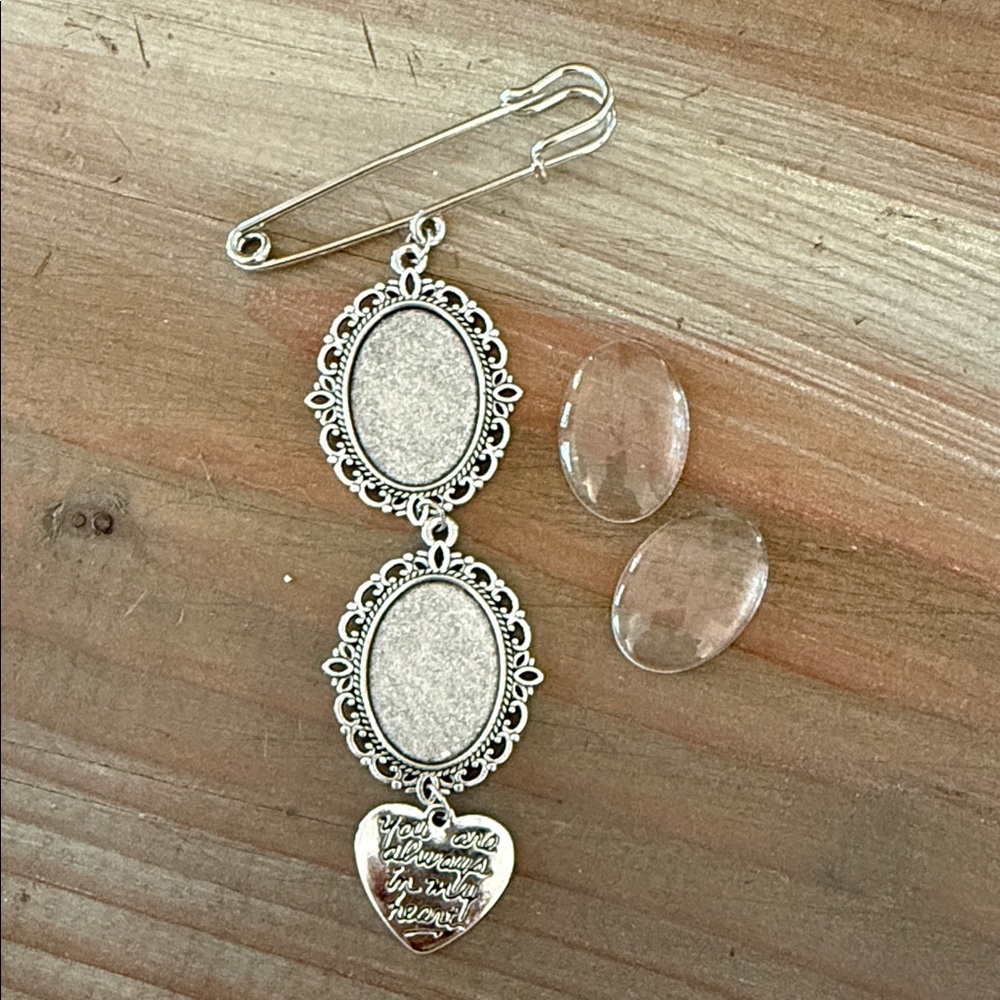 Elegant Silver Brooch with Heart Charm